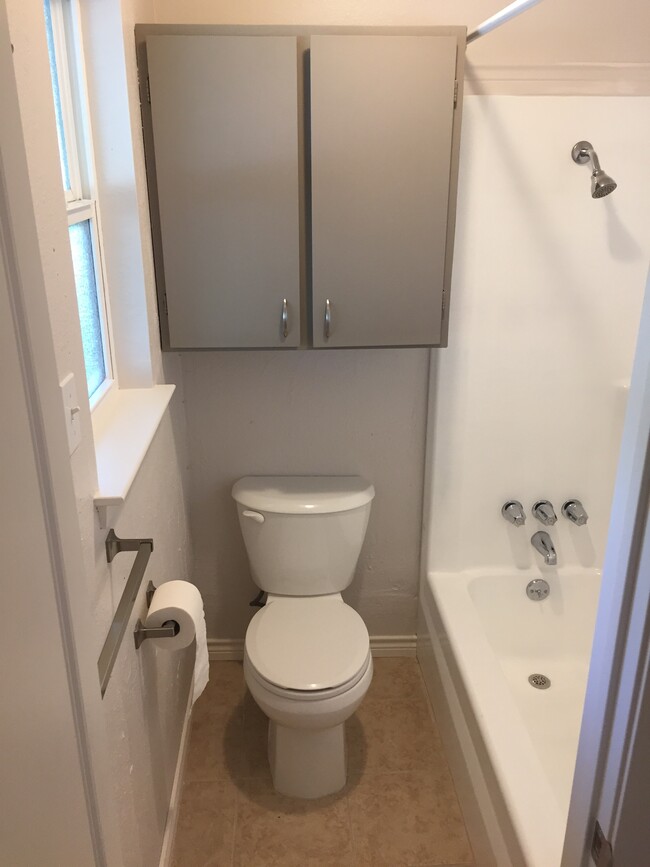 Bathroom with shower and tub - 1119 10th St.