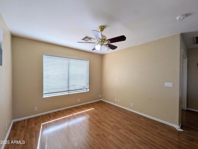 Building Photo - 8861 W Paradise Dr