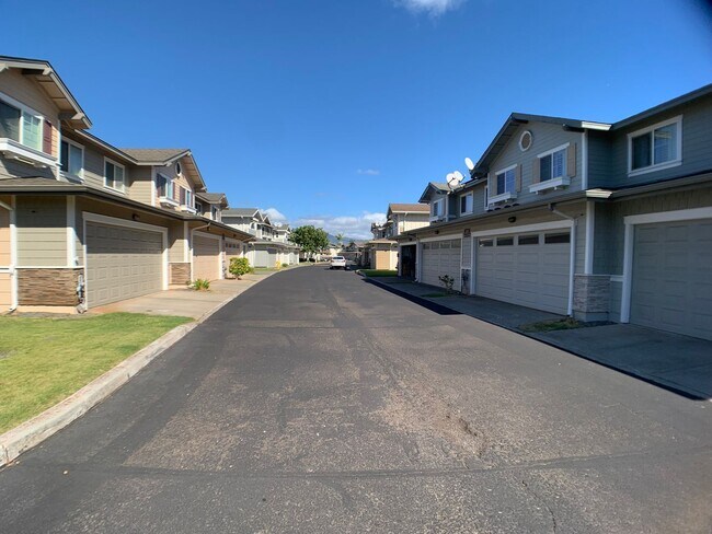Building Photo - 3 bedrooms with A/C & 2 car garage in Ewa Beach (Spinnaker Place Townhome)! First showing is 12/1...