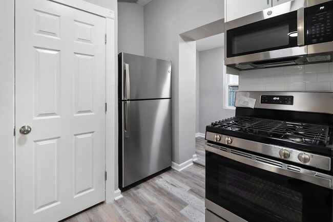 Building Photo - Renovated 4-Bedroom Home with Modern Finishes