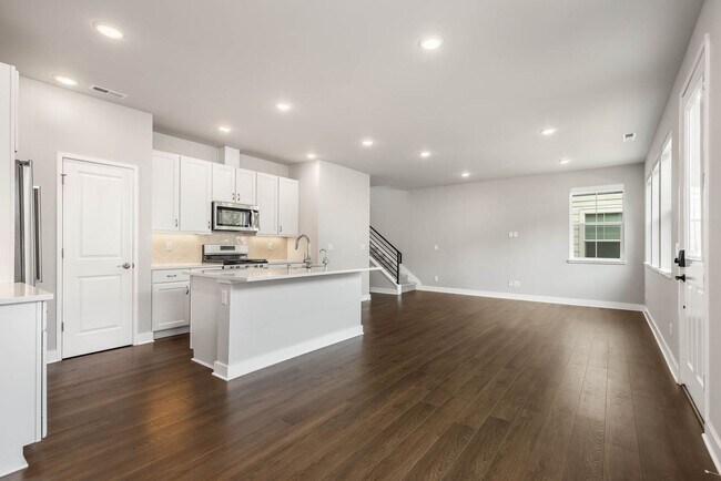 Building Photo - Beautiful River Trail 3 Bedroom Craftsman with Designer Kitchen & Spa-Inspired Primary Suite