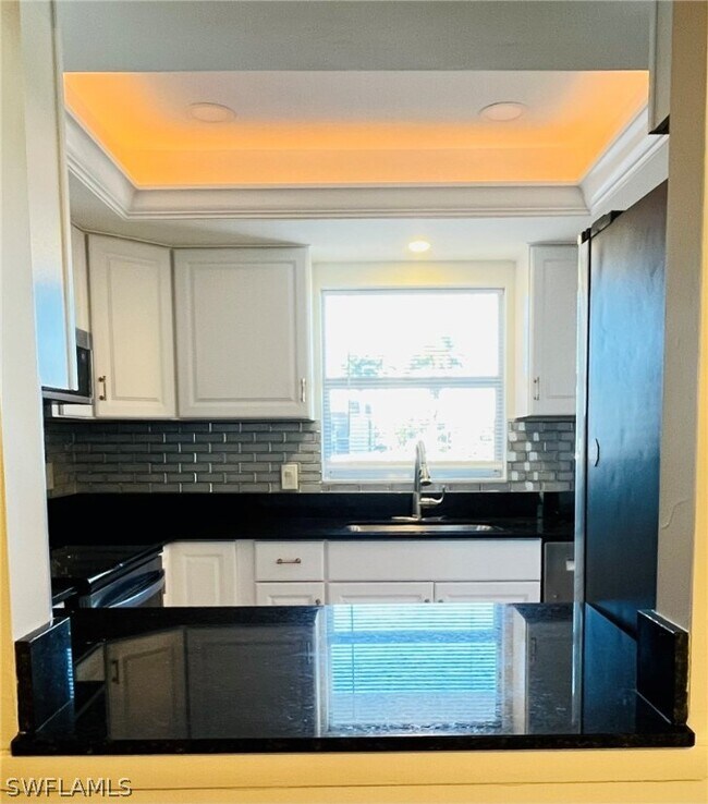 Building Photo - 4912 Tamiami Trl E