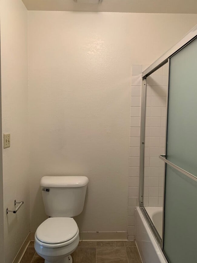 Building Photo - ENJOY THE POOL THIS SUMMER IN THIS GATED C...