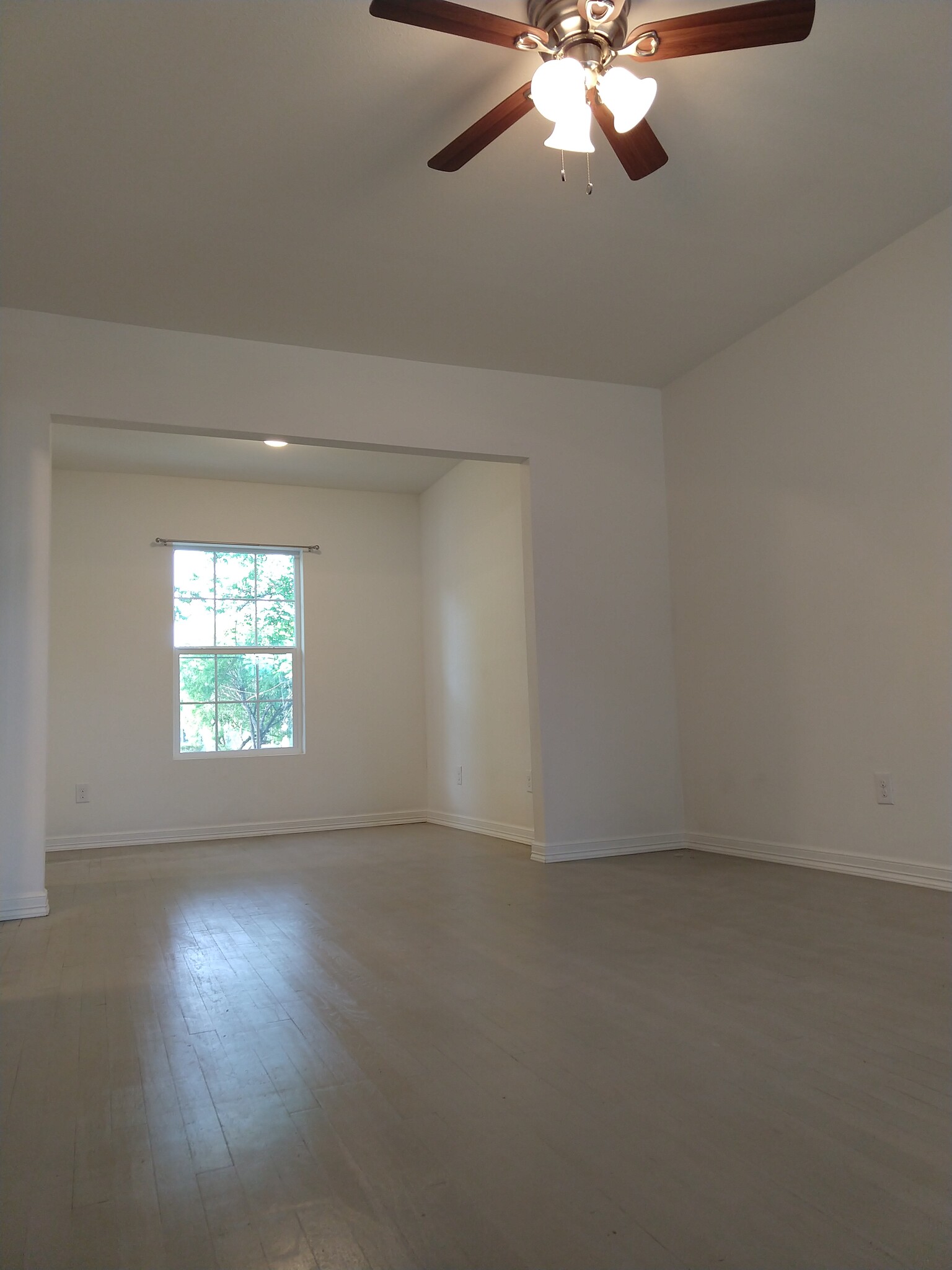 The living room flows directly into additional space for an office area or breakfast area. - 2625 Cincinnati Ave