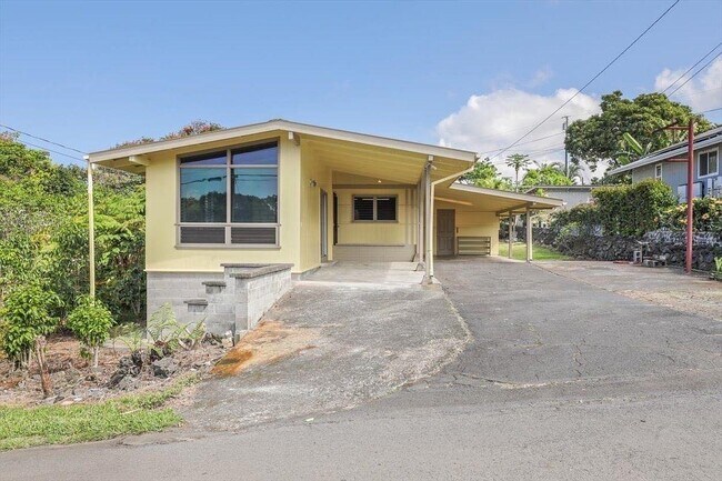 Lots of parking in the two carports and driveway - 81-1061 Captain Cook Rd