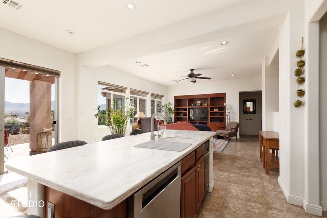 Building Photo - Beautiful home located in the gated commun...