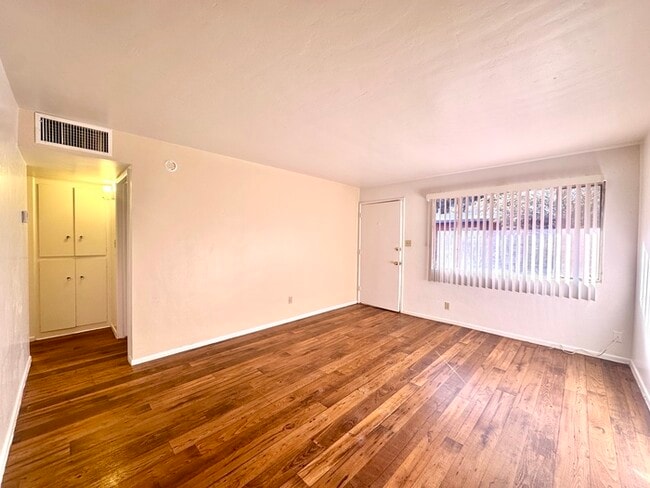 Building Photo - $400 Off Move In Special! Spacious 1 Bedroom with Hard Wood Flooring! Community Laundry and Off S...