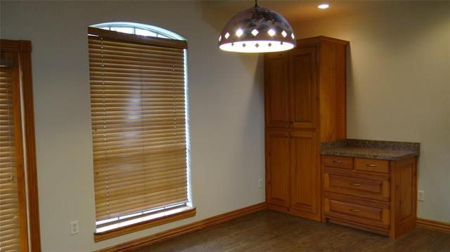 Building Photo - 5551 Woodland Hill