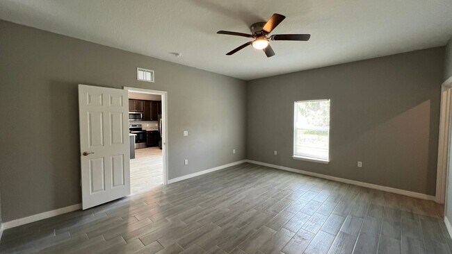 Building Photo - Smart & Stylish 3BD/2BA Palm Bay Home – Modern Upgrades, No Water Bills!