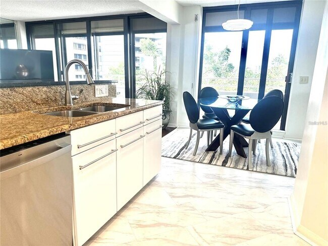 Building Photo - 5950 Pelican Bay Plaza S