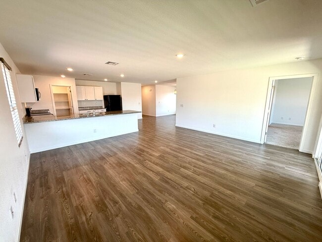 Building Photo - Spacious 4 Bedroom Home with Solar & Modern Upgrades- Available Now!