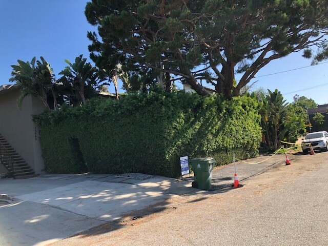 Enclosed front yard and parking spaces - 12946 Walsh Ave