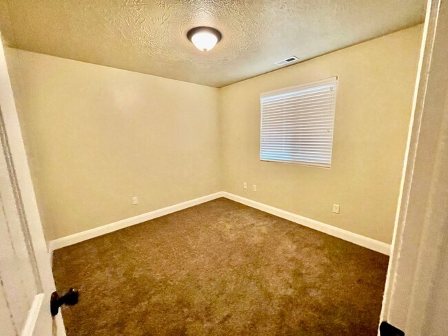 Building Photo - Pet-Friendly Three-Bedroom Townhome with G...