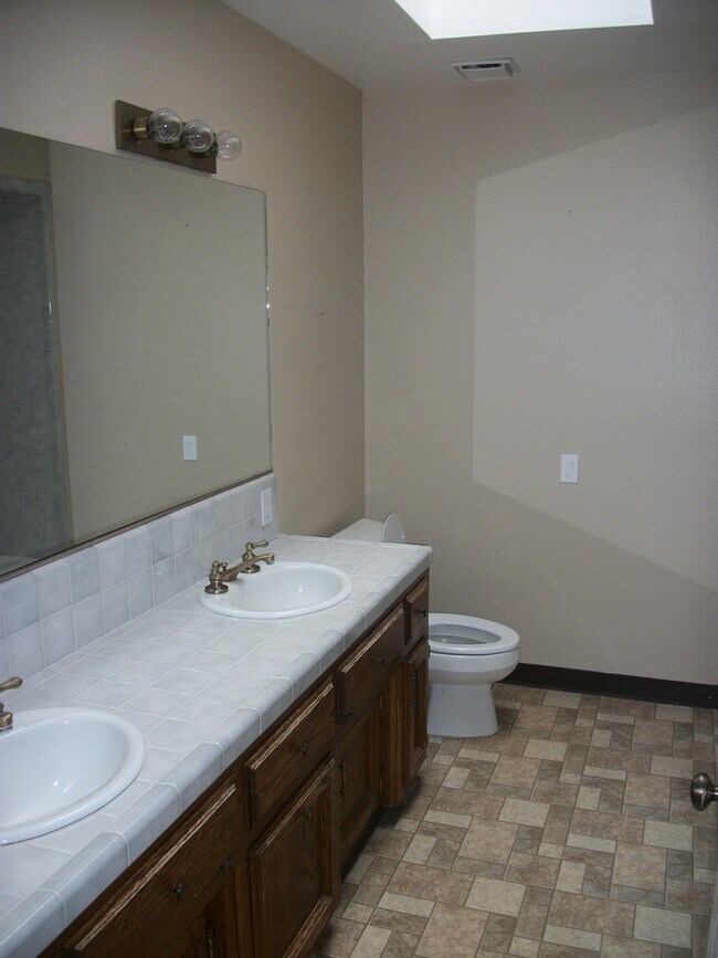 Building Photo - Coming Soon: Spacious Renovated 3 Bedroom Rosedale Home with Pool, Dual Fireplaces & Covered Patio