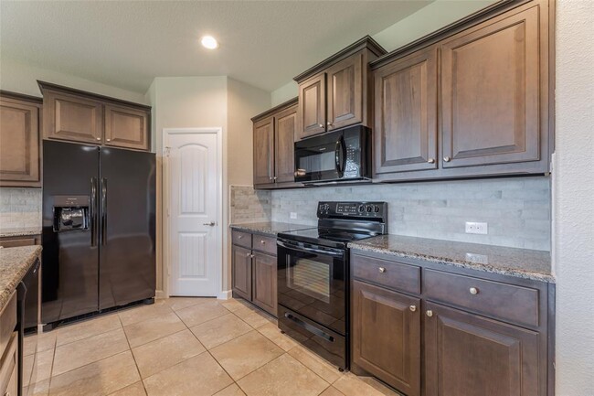 Building Photo - 1000 Meadow Scape Dr