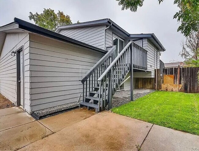 Building Photo - 7110 E 63rd Ave