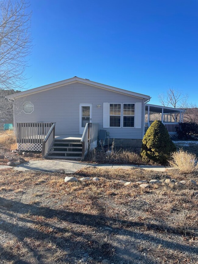 Building Photo - Mancos 3 bedroom on land