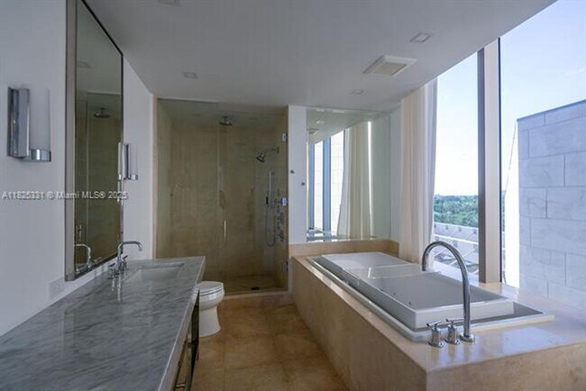 Building Photo - 9701 Collins Ave