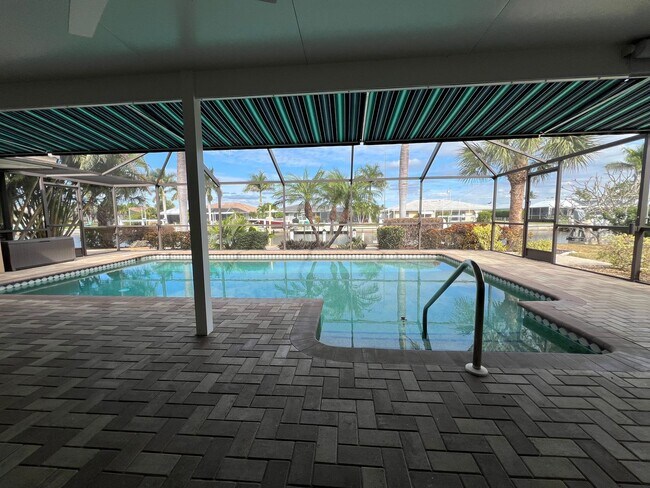 Building Photo - Furnished ** Punta Gorda Isles Vacation Home ** Heated Pool ** Canal / Boat Dock ** $7,500