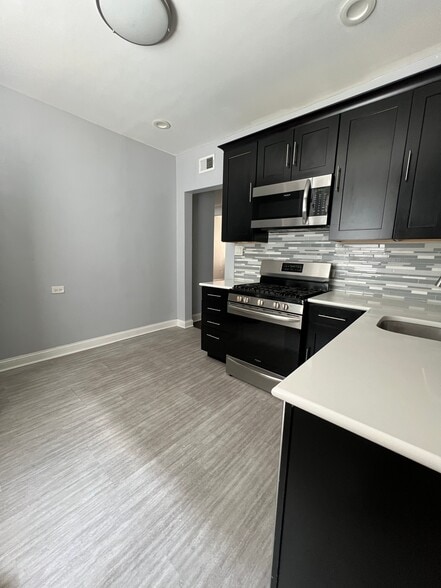 Building Photo - 6151 S Evans Ave