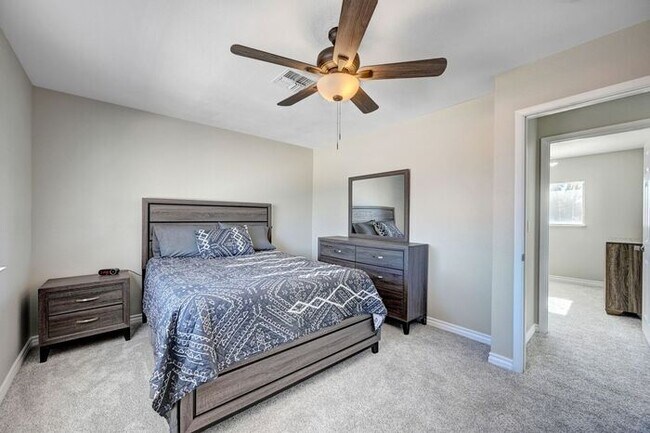 Building Photo - Fully Furnished Entertainer’s Dream with Resort-Style Pool & RV Parking!