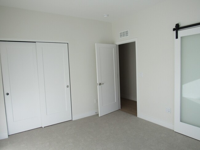 Building Photo - Town home a Block away from Sloan's Lake with roof top Deck