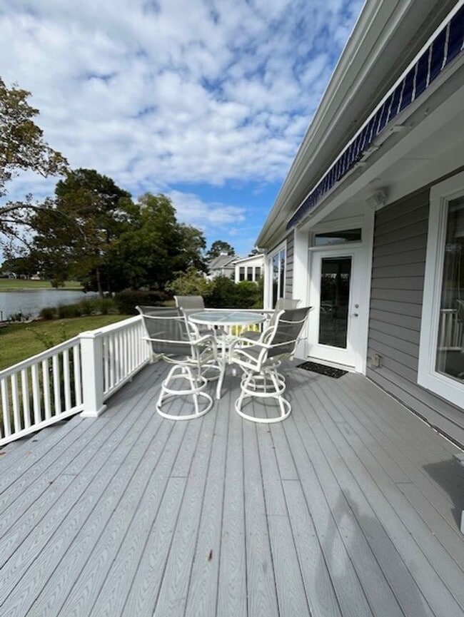 Building Photo - Welcome to Elegant Living in the Charming Porters Neck Plantation Community!