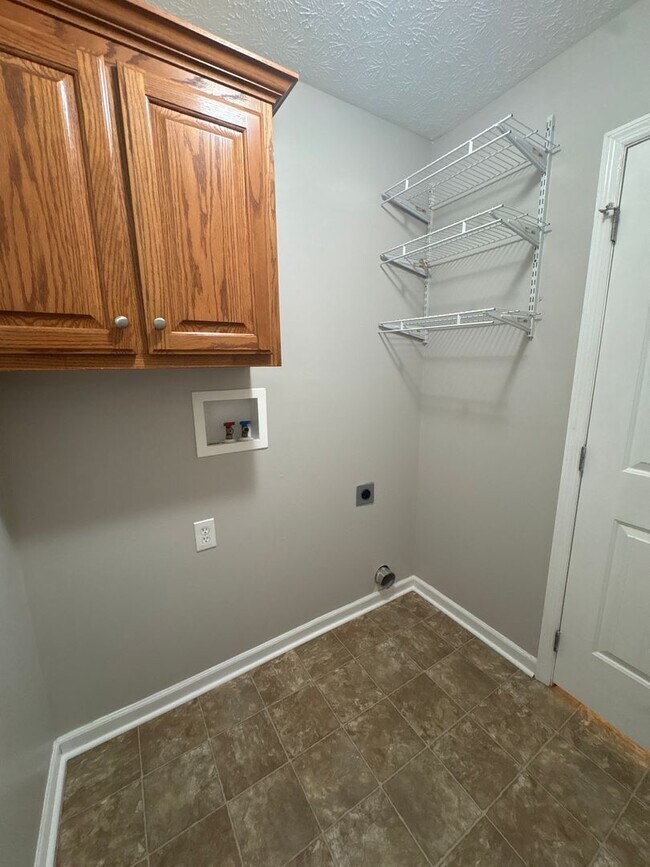 Building Photo - Charming Home with Covered Back Deck and Fenced in Yard...