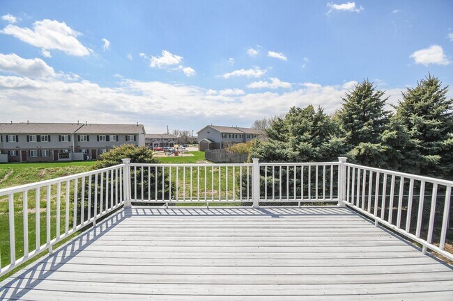 Building Photo - Updated 3BR Split-Level Home with Huge Deck, Fenced Yard & 2-Car Garage Near I-29!