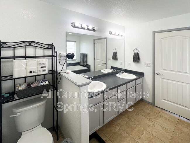 Building Photo - 6168 Rocking Chair Ln