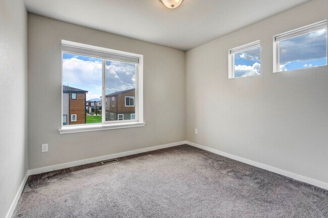 Building Photo - Modern 4BR with Open Kitchen, Patio & 2-Car Garage