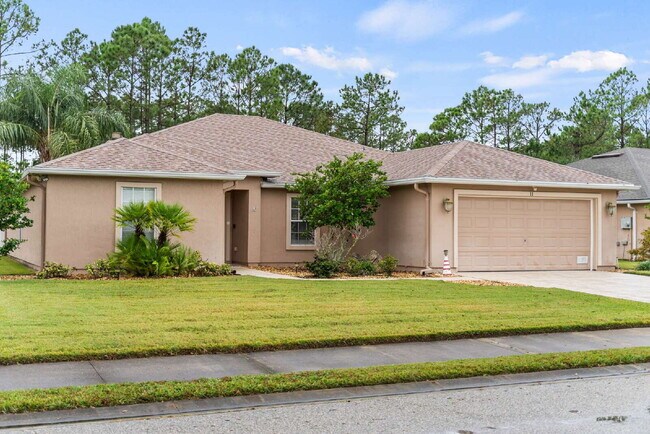 Building Photo - Luxurious Palm Coast Retreat: 4-Bed 3 Bath Pool Home