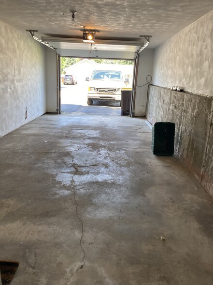 Attached and insulated garage for car and bikes, shelving etc. - 5571 Wickford Ln