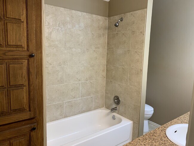 Building Photo - Spacious South Lubbock Townhome with Bonus Space & 2-Car Garage
