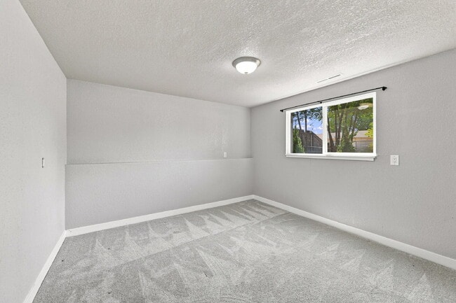 Building Photo - $2,095.95, 4 bed, 2 bath, located in Colorado Springs with a fenced-in backyard.