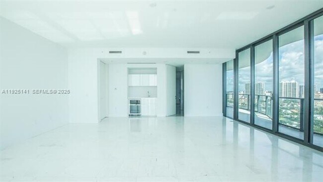 Building Photo - 19575 Collins Av