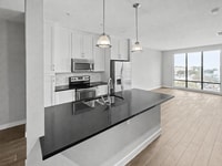 Building Photo - Sun Soaked Penthouse in Dallas