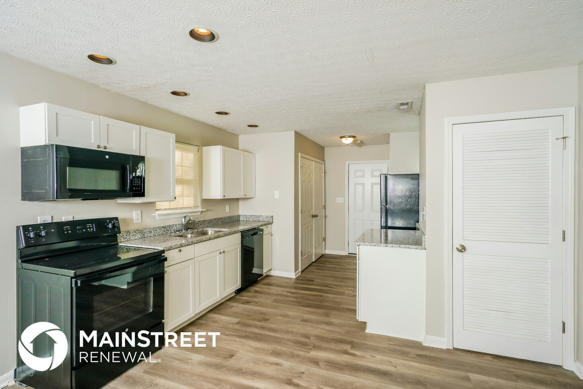 Building Photo - 7401 Hassock Dr