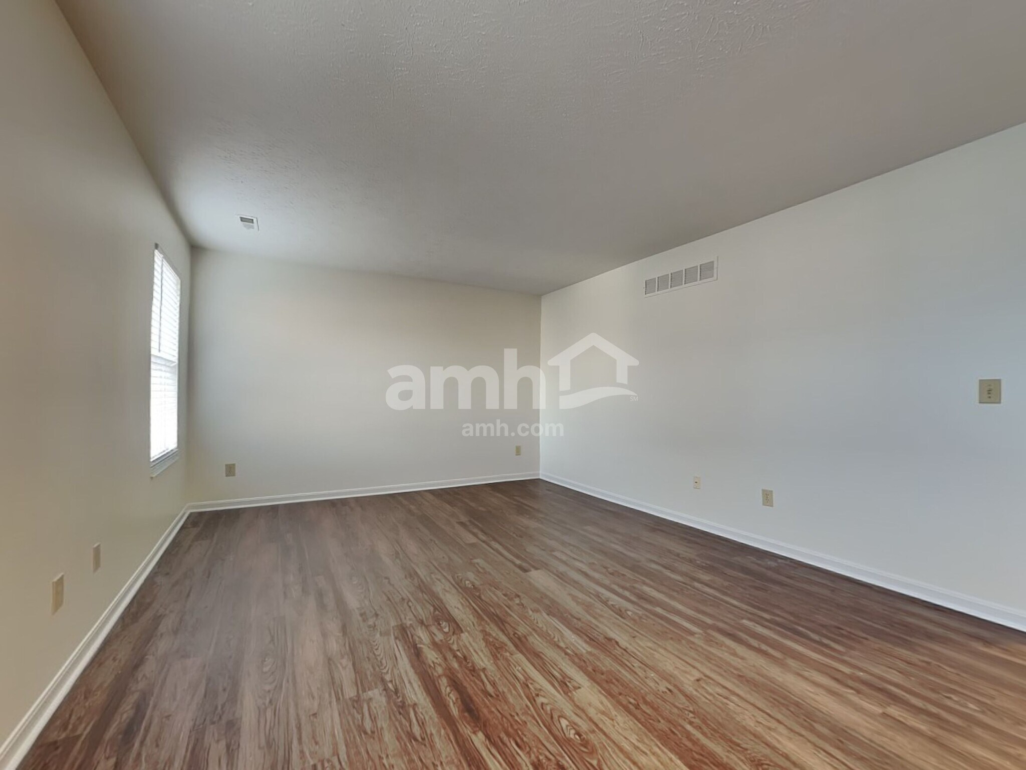 Building Photo - 6312 Satin Wood Dr