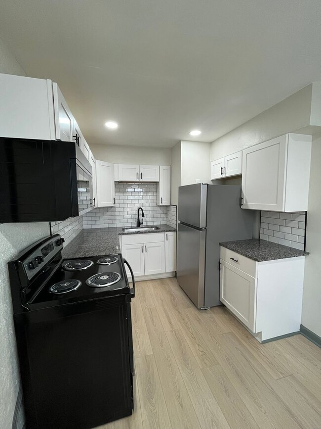 Building Photo - Beautifully Renovated 3BR Home with Modern Finishes & Spacious Living Areas