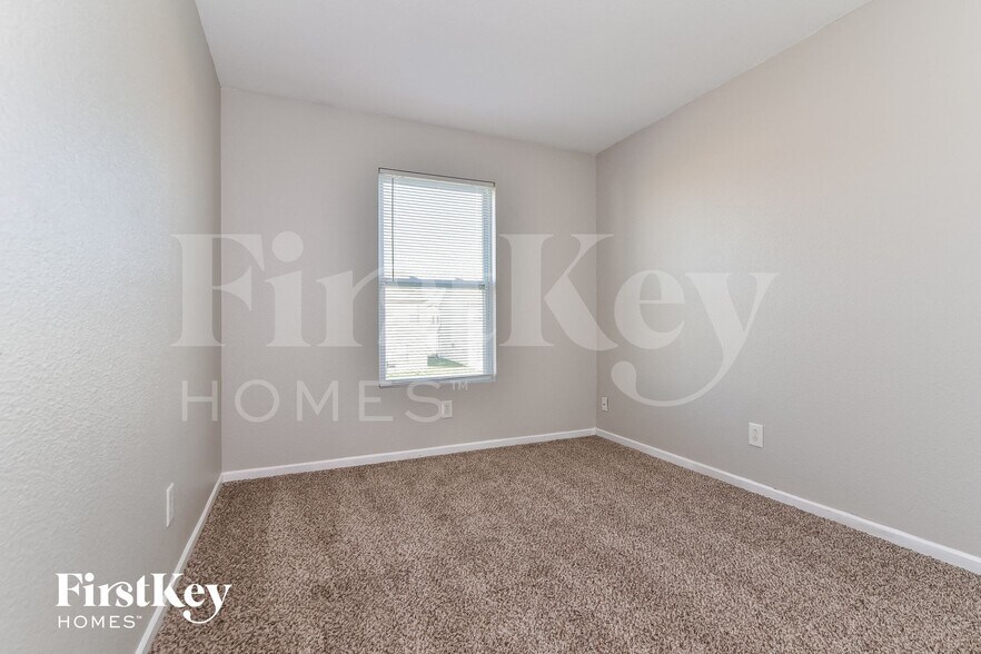 Building Photo - 8016 Grove Berry Way