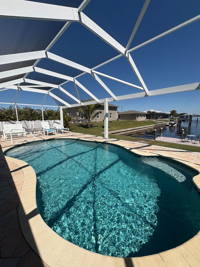 Building Photo - Sunsets & Serenity 2/2 Pool Home on a canal
