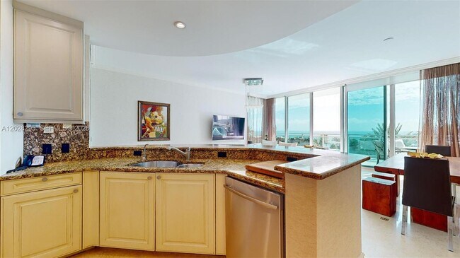 Building Photo - 10295 Collins Ave