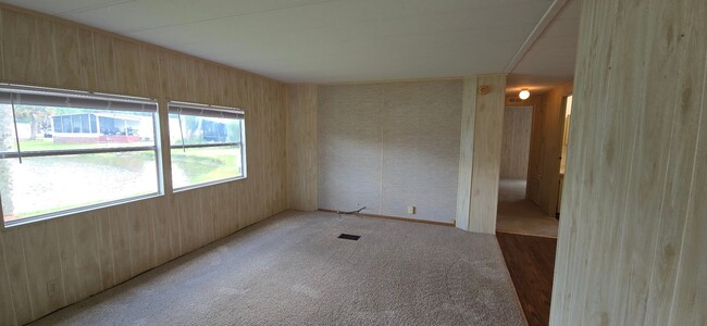 Building Photo - 2 bed 2 baths with carport