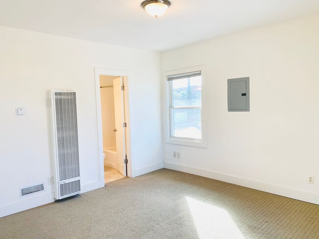 Building Photo - STUDIO WITH A PEAK VIEW OF DOWNTOWN! $1,49...
