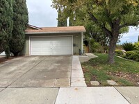 Building Photo - Beautiful Single-Story Townhome on Corner Lot with Private Courtyard & 2-Car Garage