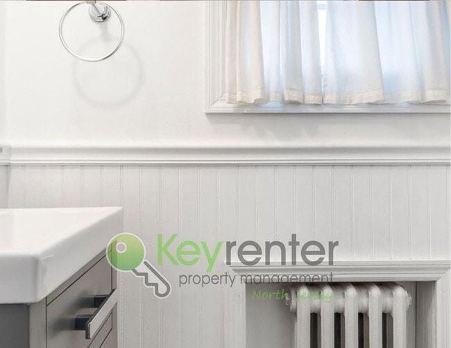 Building Photo - Spacious 3-Bed, 2-Bath Nutley Home with Bonus Office, Multi-Level Deck & Quiet Location