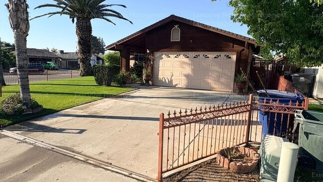 Building Photo - 3 bedroom 2 bathroom home on a corner lot with extra fenced parking.