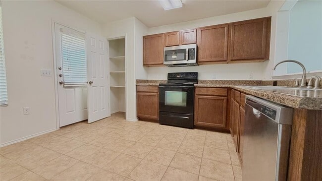 Building Photo - 5713 Nelson Oaks Dr