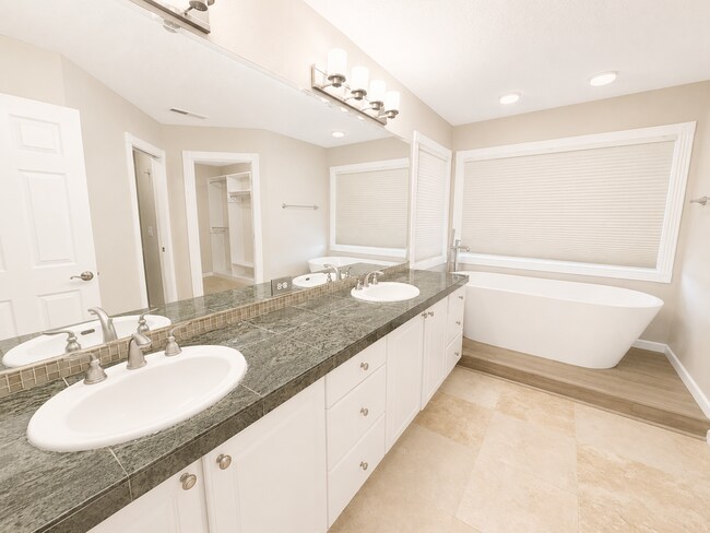 Building Photo - Light-Filled 3 Bedroom Retreat with Waterfall & Fully Fenced Yard